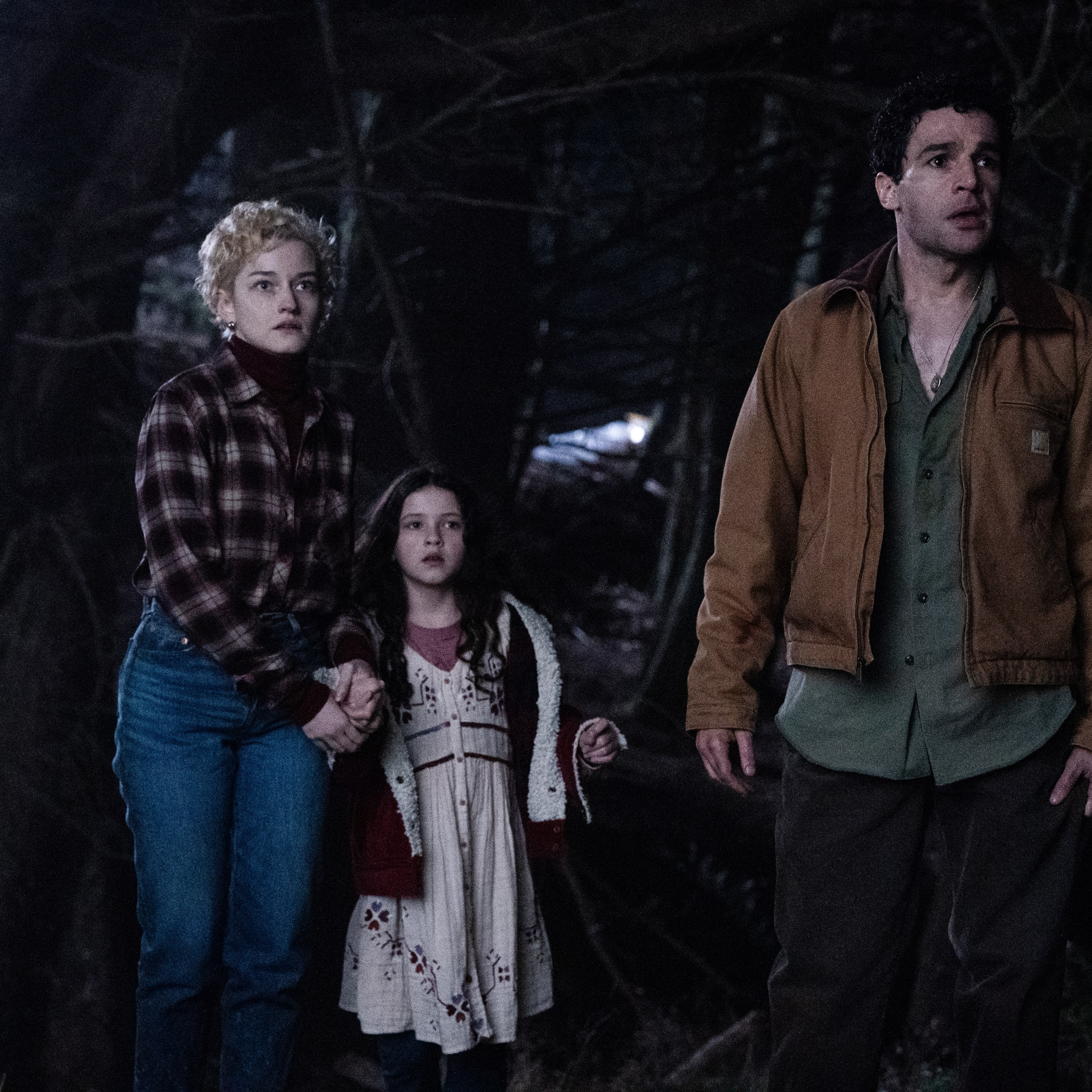 (from left) Charlotte (Julia Garner), Ginger (Matilda Firth) and Blake (Christopher Abbott) in Wolf Man, directed by Leigh Whannell.