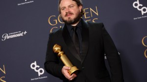 Brady Corbet, winner of the Best Director - Motion Picture award for 'The Brutalist,' poses in the press room during the 82nd Annual Golden Globe Awards.