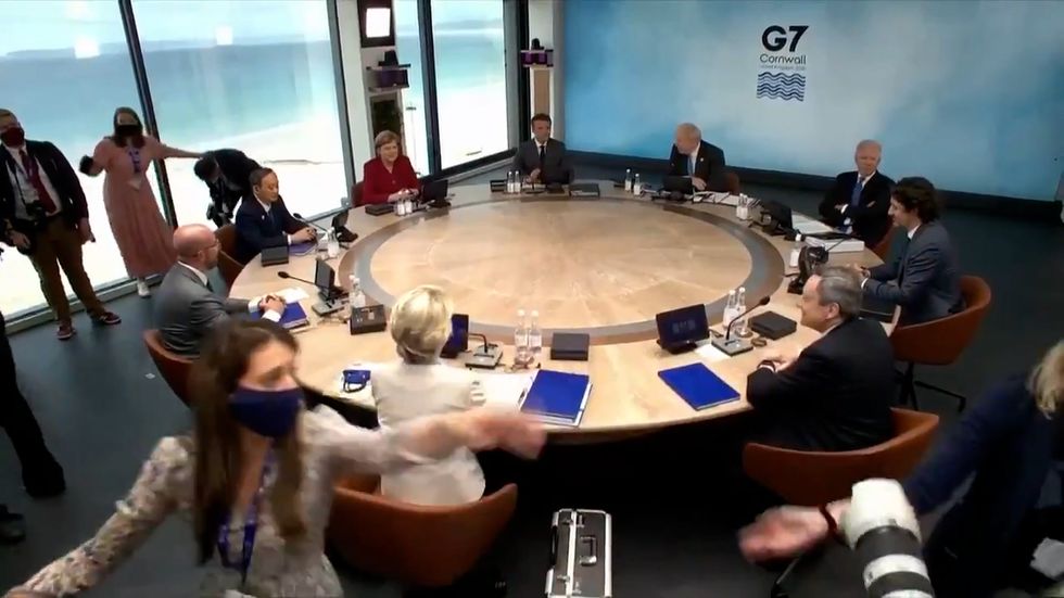 World leaders sit awkwardly as 'media circus' pushed out of G7 meeting room