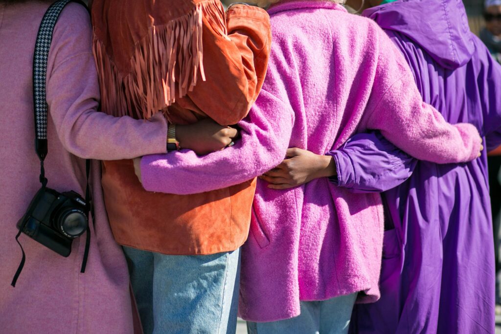 women dressed in purple