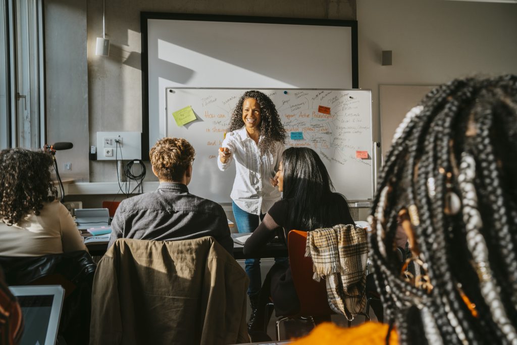 Professor teaching in college classroom. (Maskot/Getty Images)