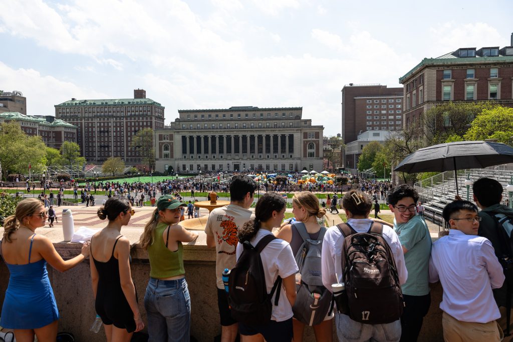 NEW YORK, NEW YORK - APRIL 29:  Students watch as pro-Palestinian demonstrators march around the "Gaza Solidarity Encampment" in the West Lawn of Columbia University on April 29, 2024 in New York City. (Photo by Michael M. Santiago/Getty Images)