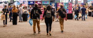 Careers at McCormick Place Convention Center. Three individuals walk into an event at McCormick Place.