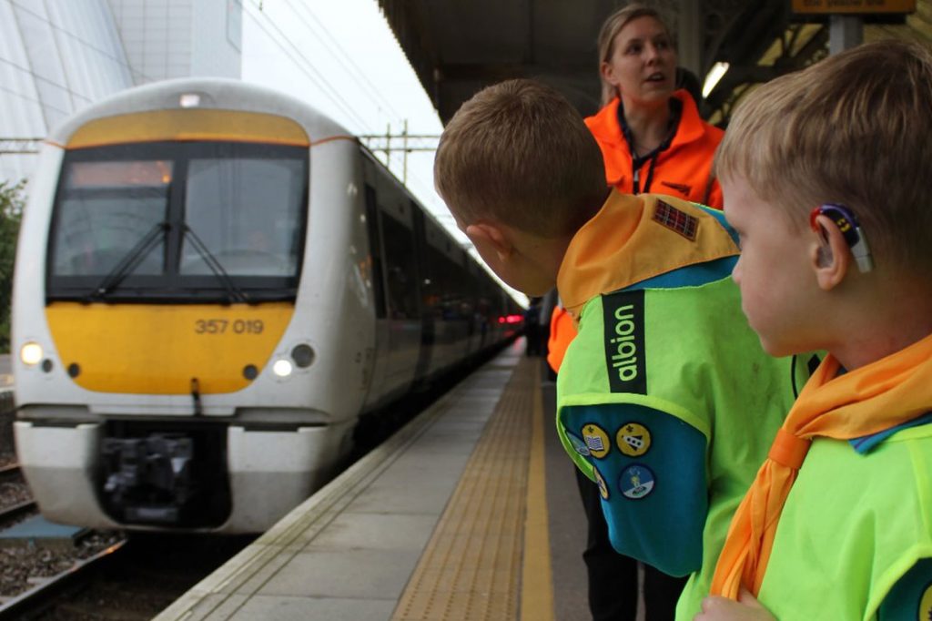 Anglia Beaver group watching a train at the station