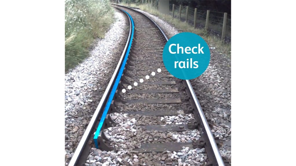 Image of a track with a check rail feature – highlighted in blue