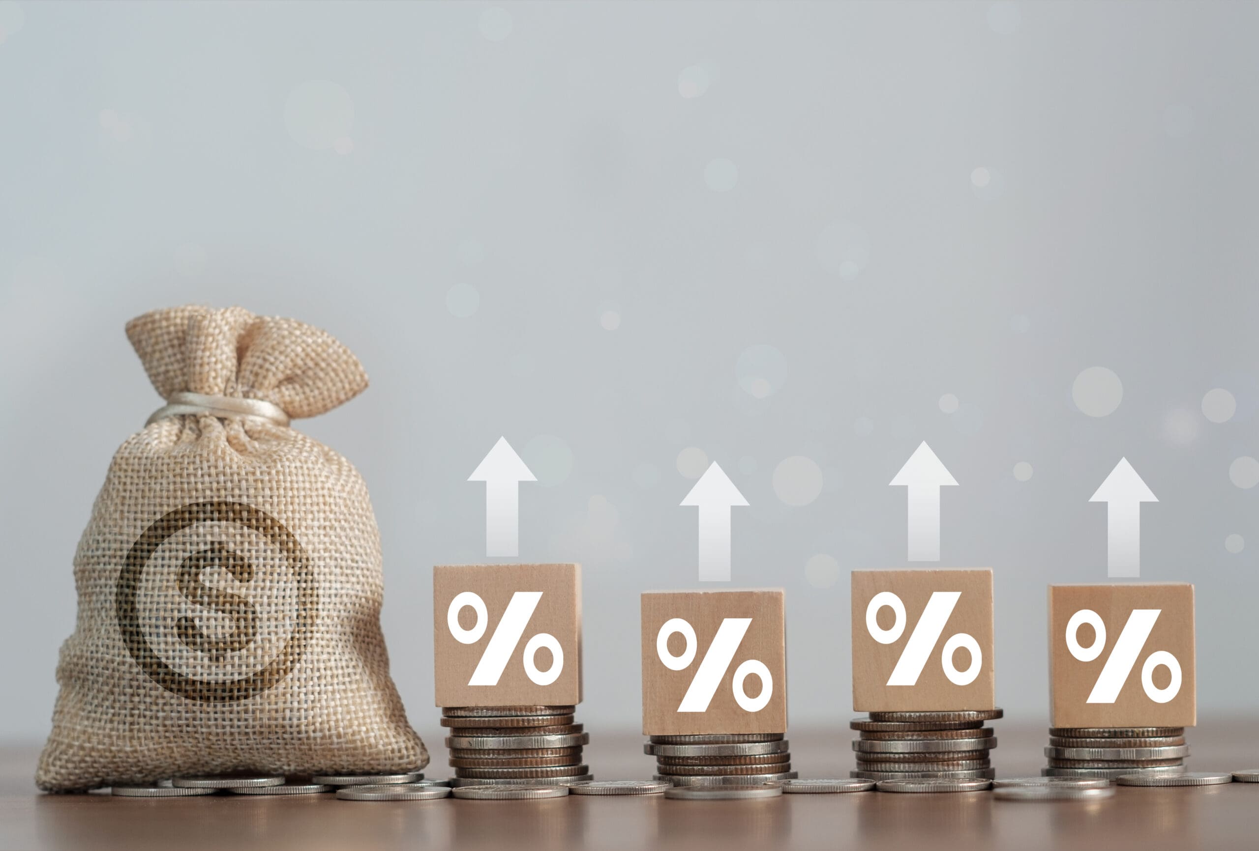 Concepts and financial investment business stock growth. Stack of silver coins with trading chart in financial.