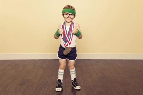 young boy dressed as award winning runner