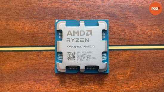 AMD Ryzen 7 9800X3D review: Gaming CPU on wood background