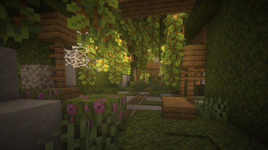 A lush green mineshaft in Yung's Better Mineshafts, one of the best Minecraft mods.