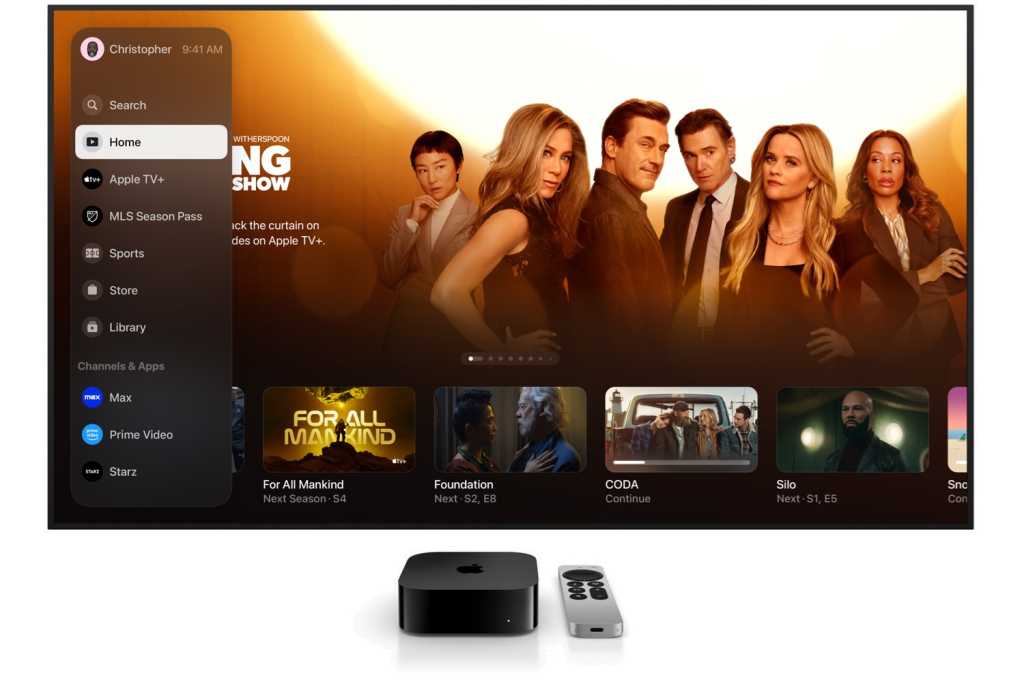 Apple TV streaming box and TV showing the Apple TV app