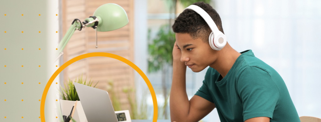 A student working at a laptop