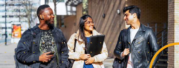 Three students walking along