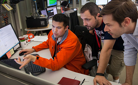 Rackers working at a desk