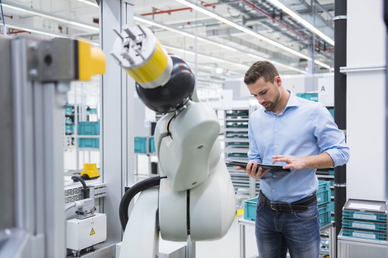 person working on a machine