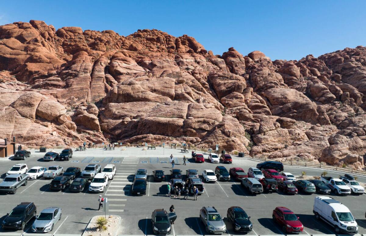 Tourists park their cars at the Calico 1 stop along the scenic route to visit the Red Rock Cany ...