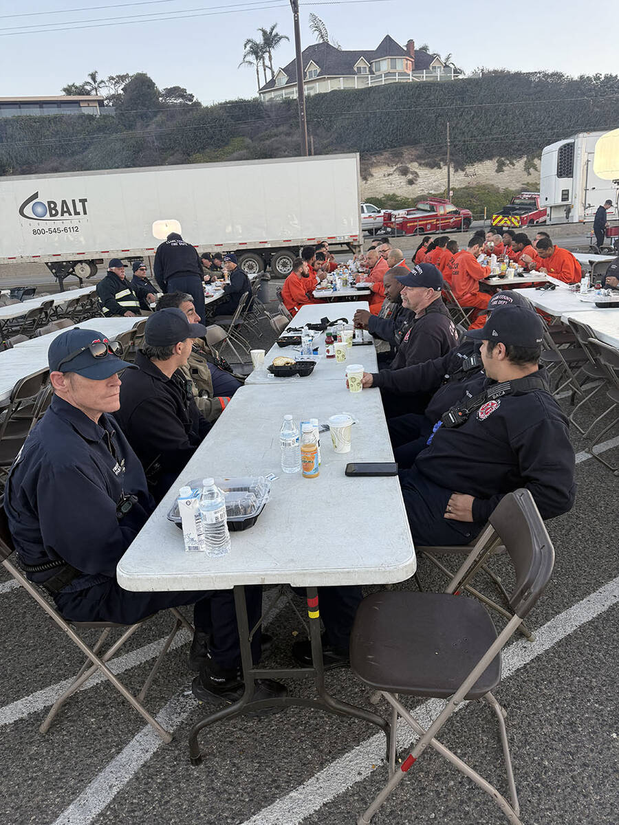 Southern Nevada firefighters finish a meal in Los Angeles on Friday, Jan, 10, 2025. (Clark Coun ...