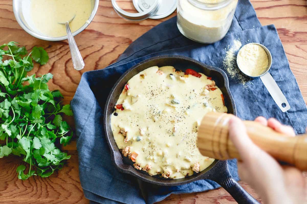 A hearty cornbread is baked right on top of this turkey chili pie, all in one skillet too for less cleanup!