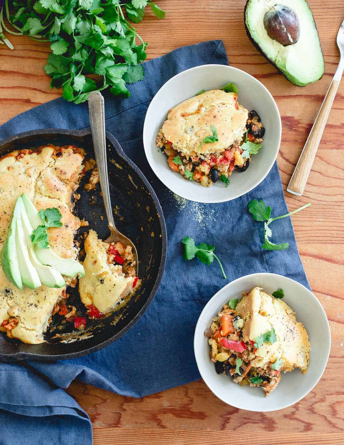 This turkey chili pie is almost as if chili and shepherd's pie collided into the perfect hearty, one-skillet meal.