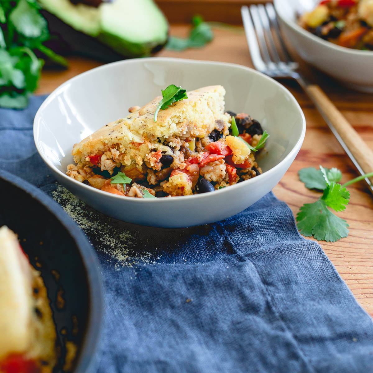 Have your chili and cornbread all in one easy skillet meal with this turkey chili pie!