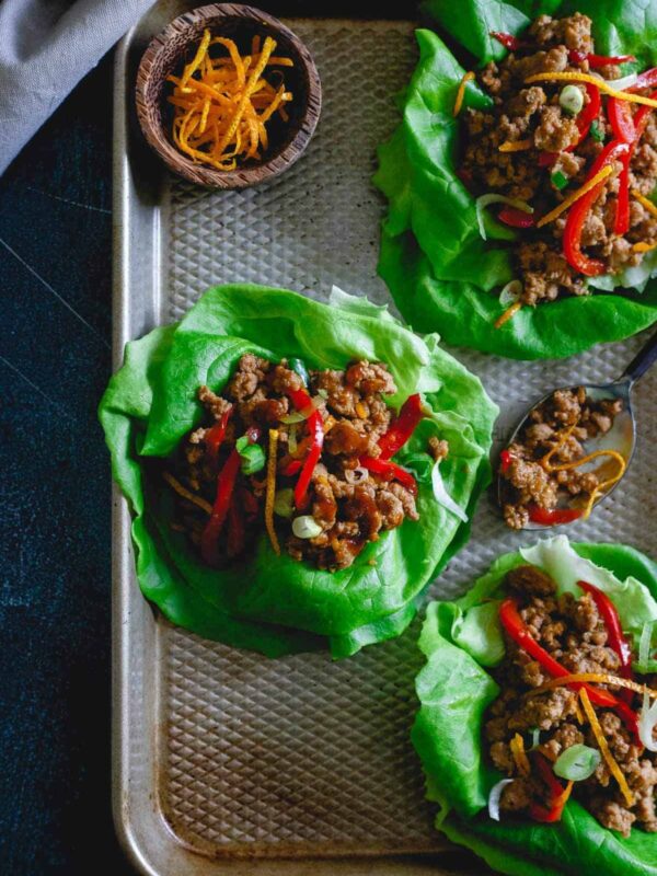 These turkey Asian lettuce wraps are infused with a sticky, sweet, savory and slightly spicy orange sauce making them an irresistibly easy and tasty meal.