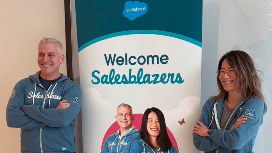 Two Salesblazers wearing Salesblazer hoodies