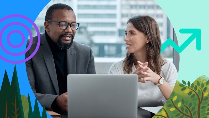 Photo of two sales reps looking at a laptop and going over the ROI of loss.