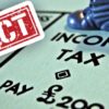 fact stamp over income tax square monopoly board