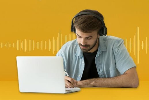 Man transcribing at desk with laptop and sound wave background