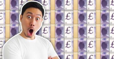 shocked man in front of money