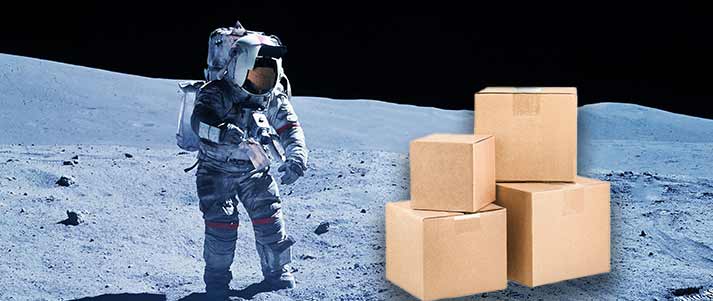 astronaut on moon with boxes