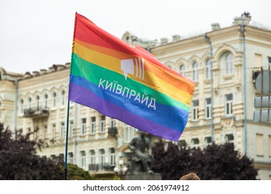 Kyiv, Ukraine - 09.19.2021: Pride Parade. Participants of the march walk the streets of the city with a rainbow flag. A crowd of young people. Concept LGBTQ.