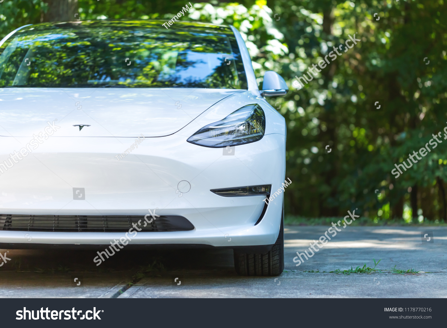 RALEIGH, NC - JULY 08, 2018: An all electric Tesla Model 3 in Raleigh, NC. The Model 3 is set to be the Tesla's first mass market electric vehicle.