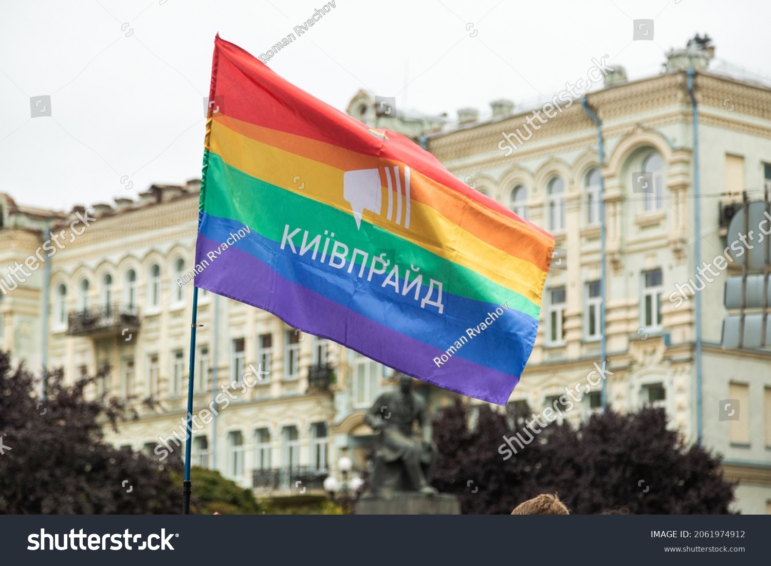 Kyiv, Ukraine - 09.19.2021: Pride Parade. Participants of the march walk the streets of the city with a rainbow flag. A crowd of young people. Concept LGBTQ.