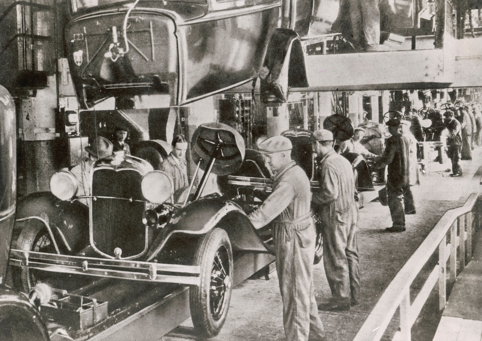 Photo of a Ford car Assembly Line circa 1929