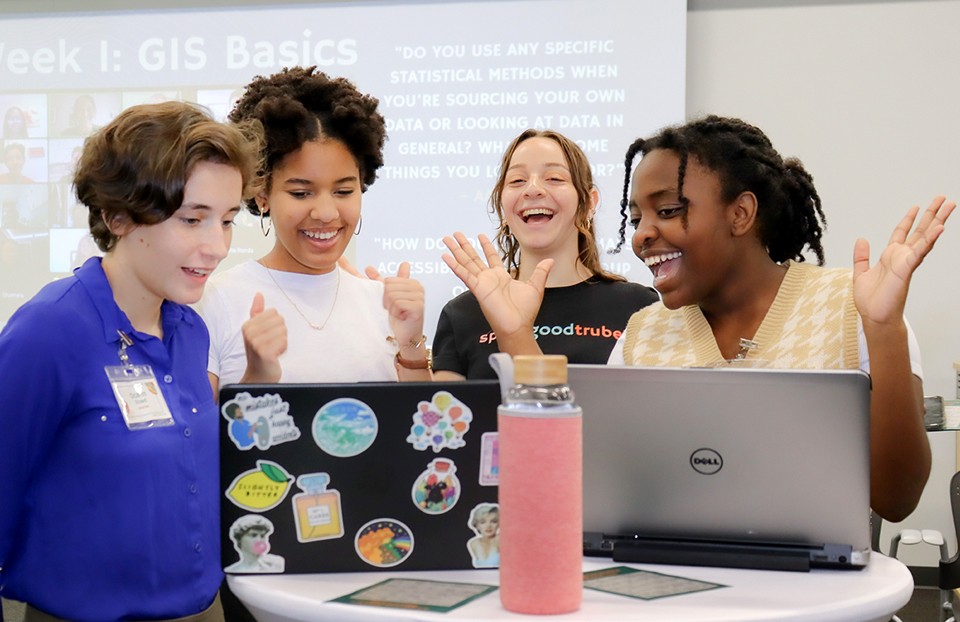 STEM Action Grants 2024 - Photo courtesy of Trubel & Co., a tech-justice nonprofit empowering underserved youth to address societal challenges through equitable data analytics, responsible technology, and inclusive design, featuring students interacting at a STEM event.