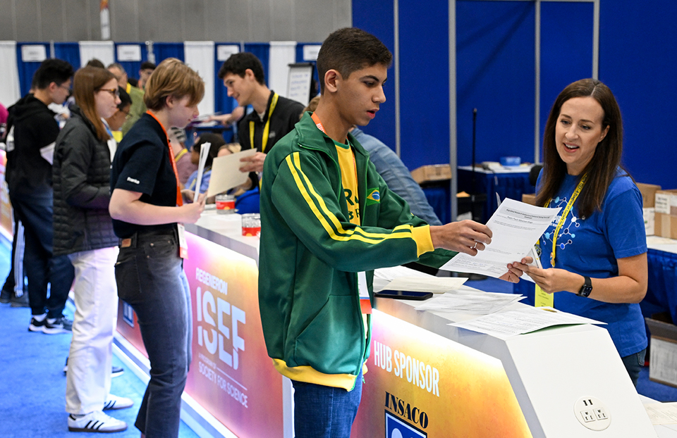 ISEF 2024 Los Angeles, CA - International Science and Engineering Fair - volunteer at the Hub assisting finalist