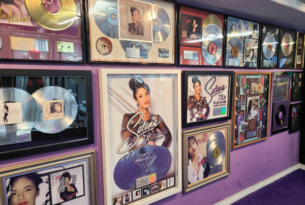 Museum wall with Selena pictures and gold albums