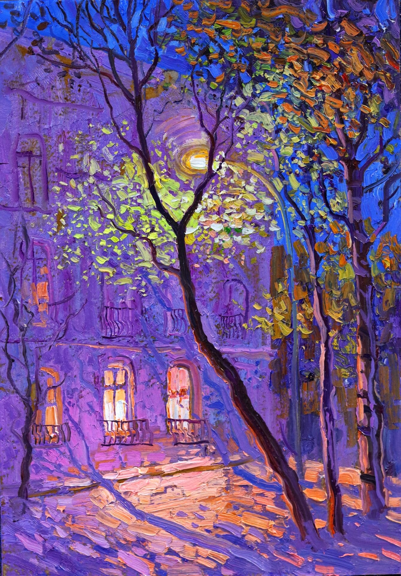 an oil painting of a nighttime scene in Paris with illuminated ground-level windows and a street light casting shadows of trees onto the ground and building