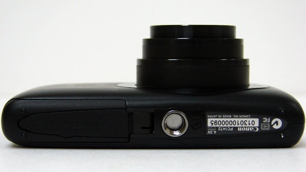 Side view of a Canon IXUS 130 camera.