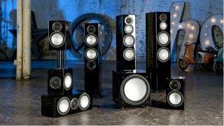 Monitor Audio Silver 6AV12 speaker set displayed in an industrial room.