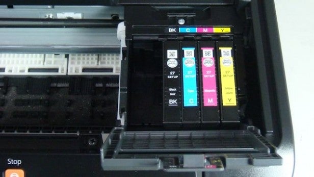 Epson WorkForce WF-7110DTW - CartridgesInk cartridge compartment of an Epson WorkForce printer.