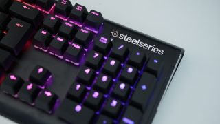 SteelSeries Apex M750 mechanical keyboard with RGB lighting.