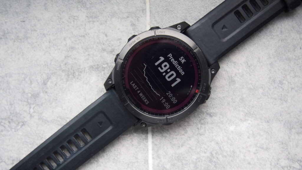 Garmin Fenix 7 showing 5k predicted timeGarmin Fenix 7 watch displaying 5K running prediction time.