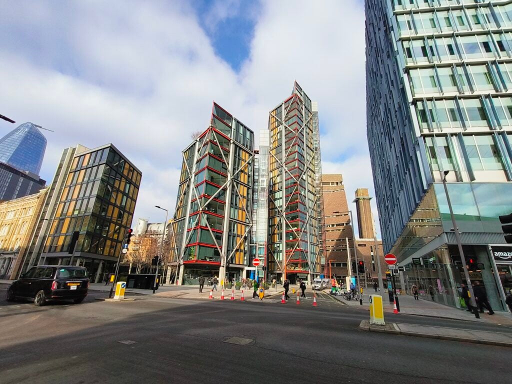 Modern urban street with distinctive architecture and clear sky