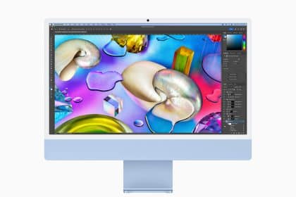 iMac displaying colourful graphics on the screen.