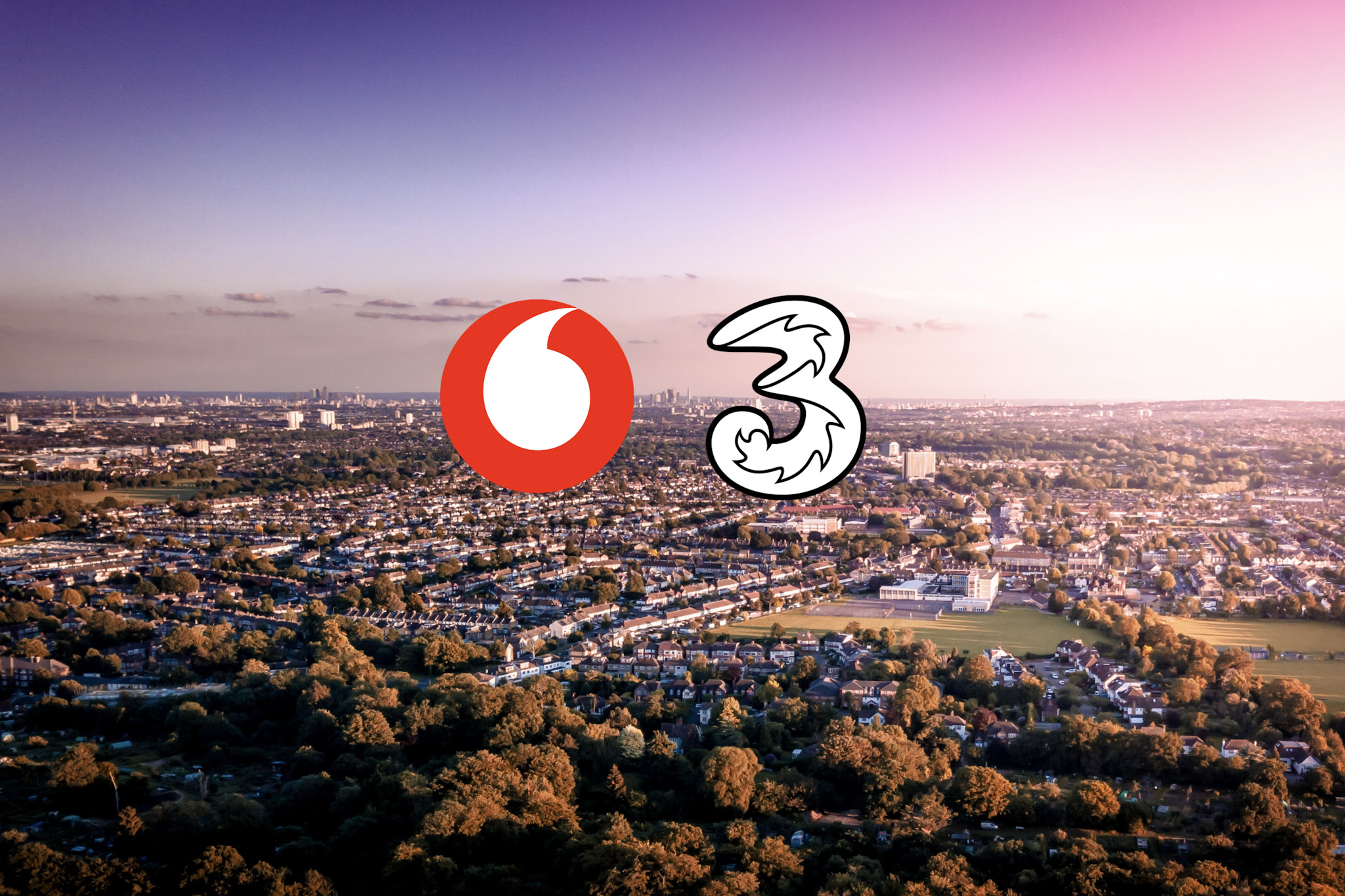 Vodafone Three UK logos side by side on background of UK countryside.