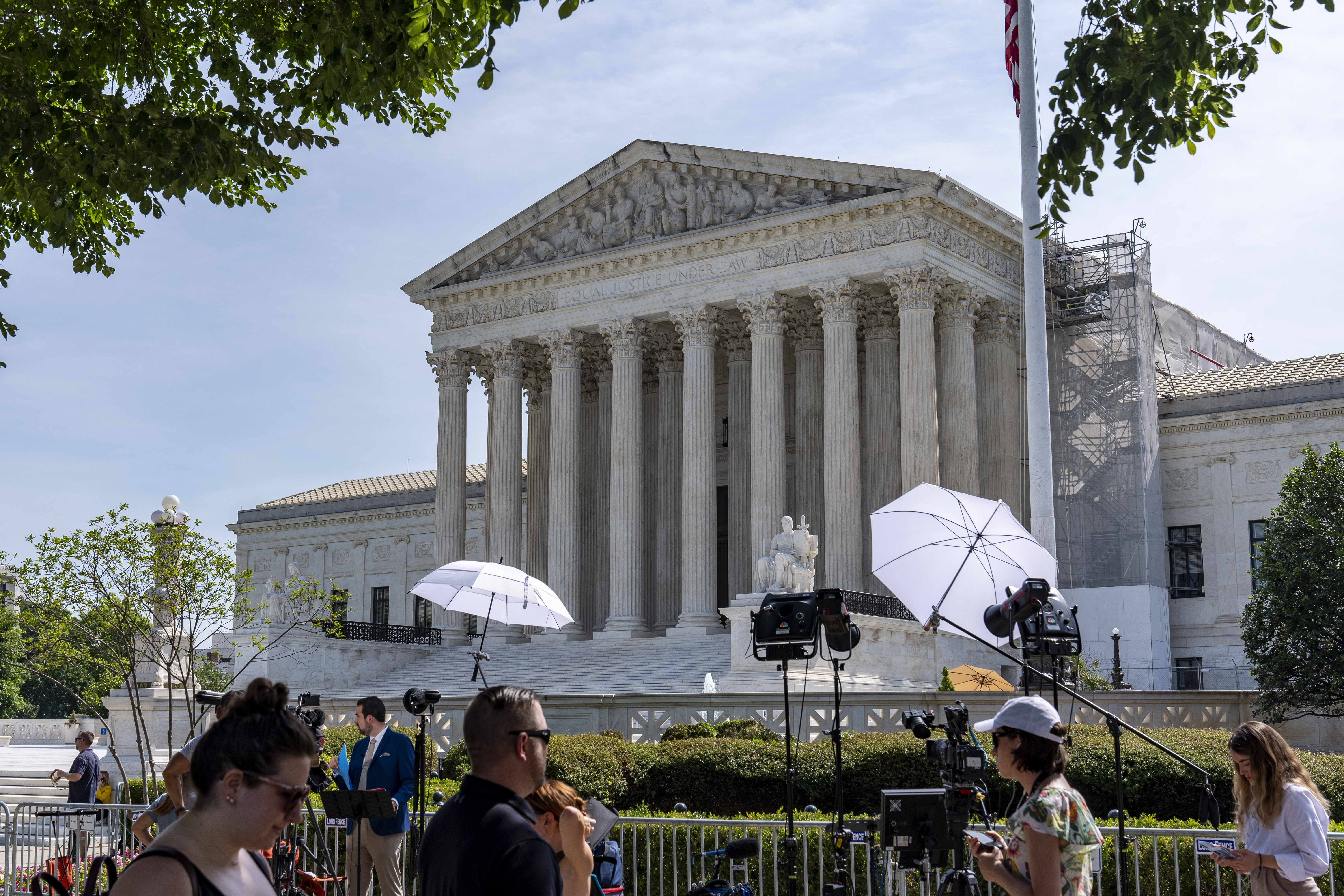 Journalists await the Court's decisions outside the Supreme Court, Wednesday, June 26, 2024, in Washington. (AP Photo/Alex Brandon)
