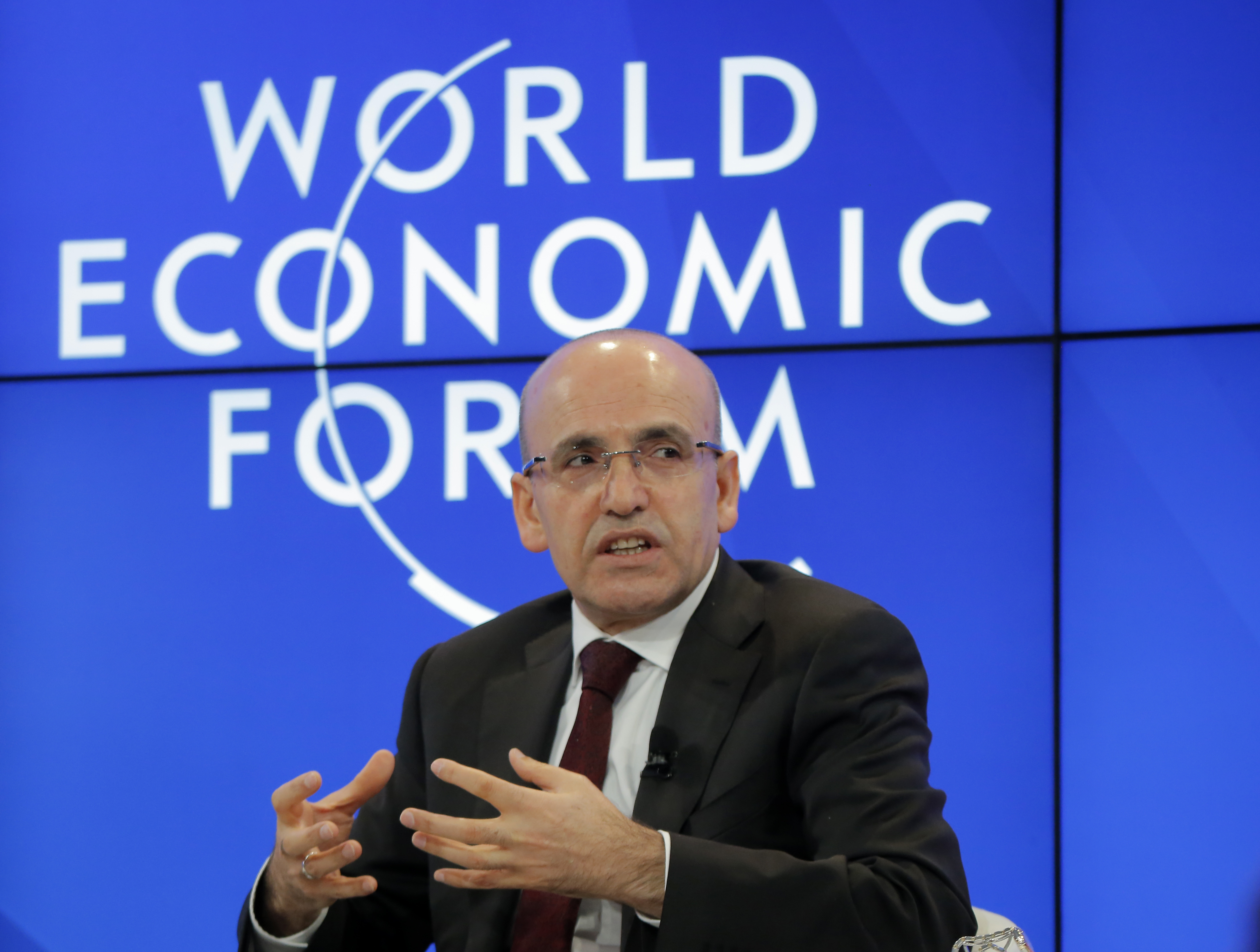 FILE - Turkish Finance Minister Mehmet Simsek speaks during a session of the World Economic Forum in Davos, Switzerland, Friday, Jan. 20, 2017. Turkey on Friday, June 28, 2024, welcomed a decision by an international watchdog to remove it from a so-called “gray list” of countries that have not fully implemented measures to fight money laundering and terrorism financing. “We succeeded,” Turkish Finance Minister Mehmet Simsek wrote on the social media platform X, as the decision was being announced. (AP Photo/Michel Euler, File)