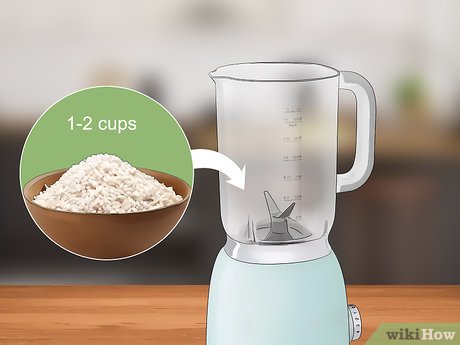 Step 1 Add 1-2 cups (185-370 g) of uncooked rice to your blender.