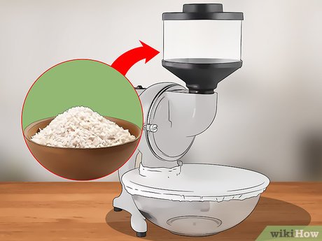 Step 2 Pour 1-2 cups (185-370 g) of uncooked rice into the hopper.